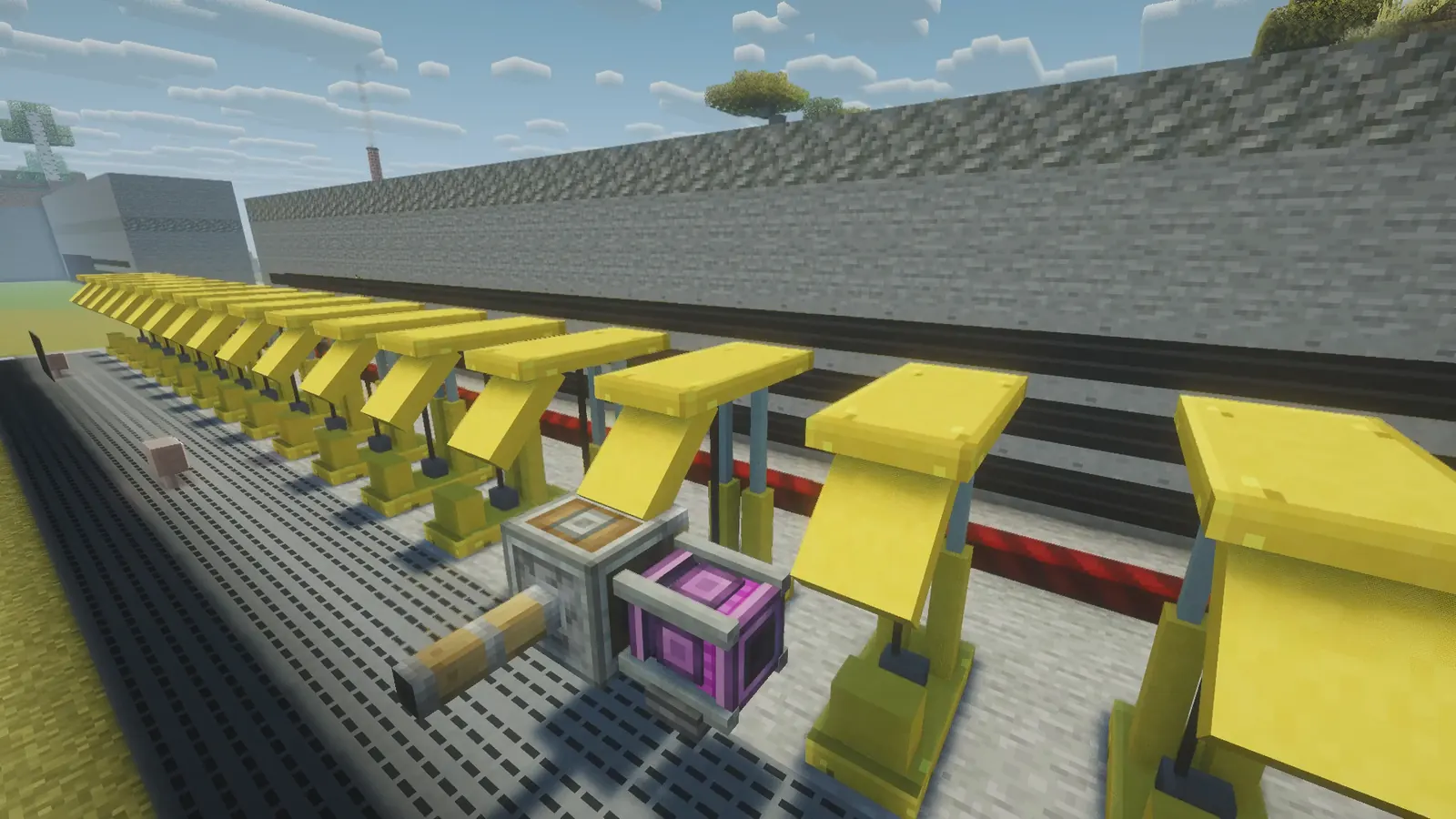 Row of yellow powered roof supports along the longwall